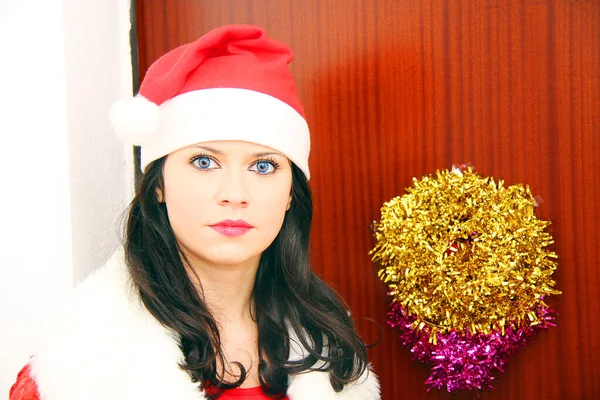 Beautiful and sexy woman wearing santa clause costume — Stock Photo, Image