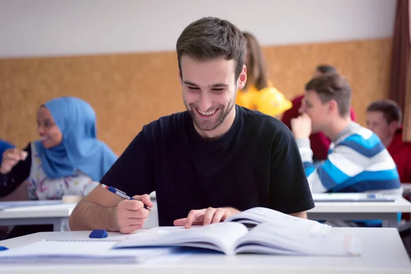 Male university architecture student working on practice lessons