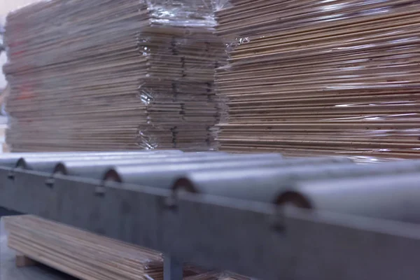 Timber Flooring Factory. Pile of cut wood in factory storage war — ストック写真