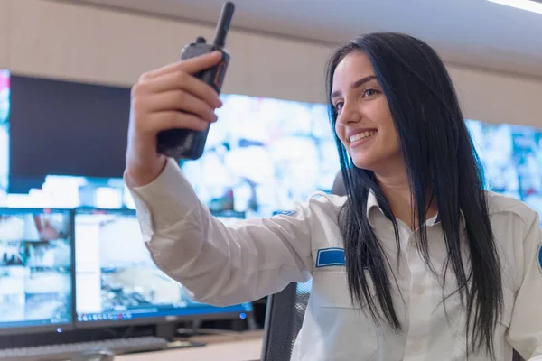 Security guard monitoring modern CCTV cameras in surveillance ro — Stock Photo, Image