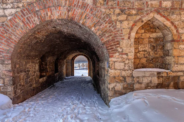 Gate of the old fortress under the snow, note shallow depth of field