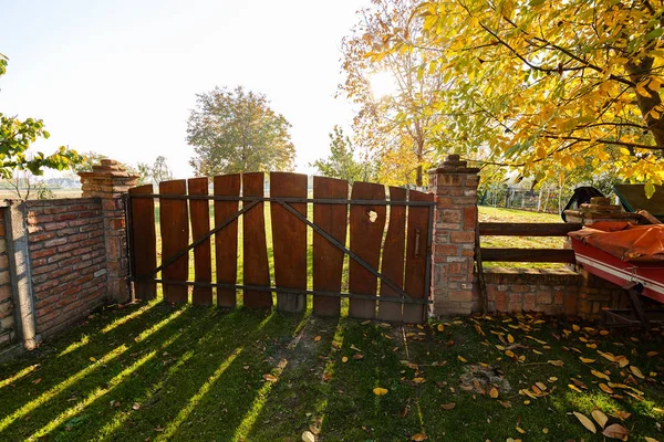 Wooden fence in the yard — Stock Photo, Image