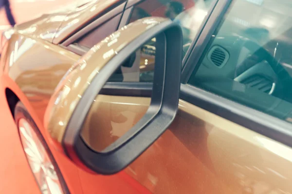 rearview mirror on the motor vehicle, note shallow depth of field