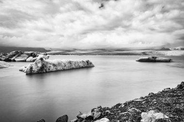 Jokulsarlon glacier lagoon in Iceland. Long exposure shot makes, black and white, vintage