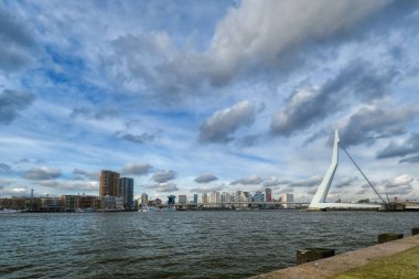 Rotterdam - 12 February 2019: Rotterdam, The Netherlands downtown skyline at dusk in South Holland, Rotterdam,Netherlands. Part of the quay at the front