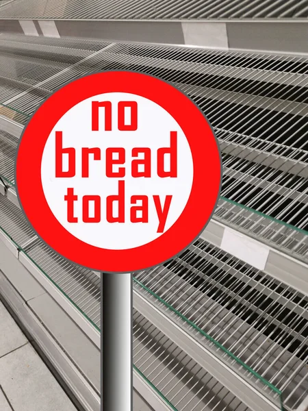 Empty shelves in store in The Netherlands, Europe, Supermarket with empty shelves for bread. With stop sign indicating warning of No Bread Today - COVID-19, Corona virus concept