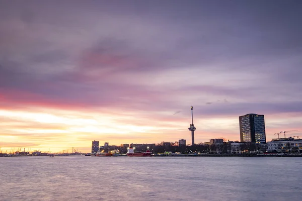 Rotterdam - 12 February 2019: Rotterdam, The Netherlands The Euromast tower Rotterdam at night. Big ships and canal on the foreground, Rotterdam, The Netherlands — Stock fotografie