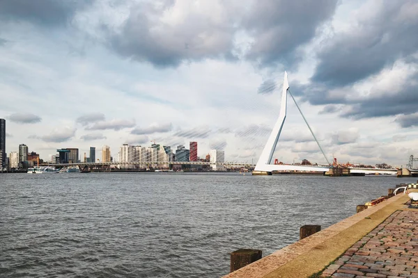 Rotterdam - 12 February 2019: Rotterdam, The Netherlands downtown skyline at dusk in South Holland, Rotterdam,Netherlands. Part of the quay at the front — Stock Fotó