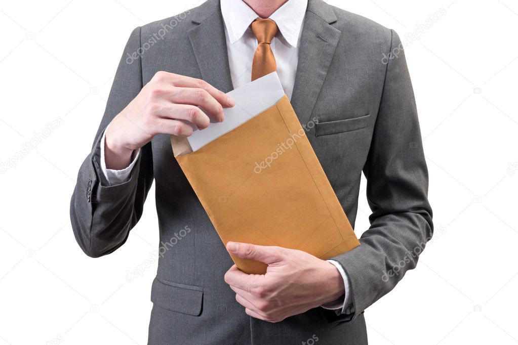 Businessman holding an envelope with blank sheet  isolated on white background.