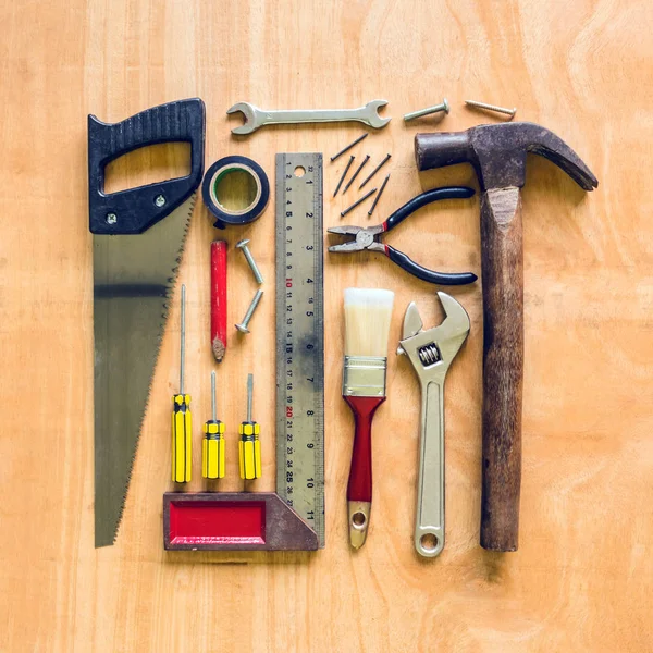 Set voor ander werk tools op houten tafel achtergrond. — Stockfoto