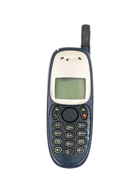 Старый мобильный телефон на белом фоне — стоковое фото