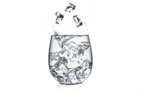 Glass of water with ice cubes on white background. — Stock Photo, Image