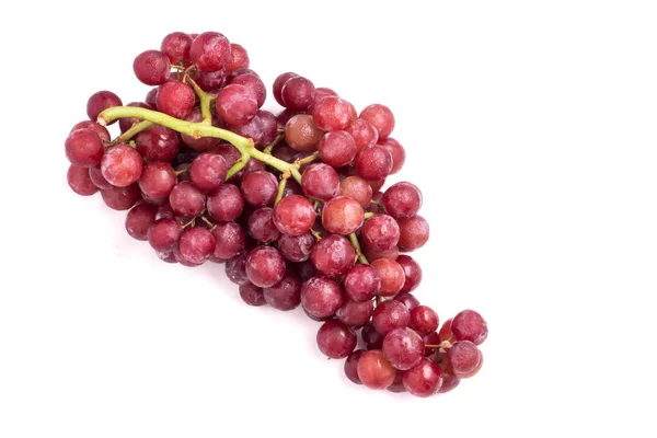 Uvas vermelhas sobre um fundo branco. — Fotografia de Stock