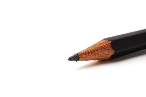Tip van een potlood op een witte achtergrond, vrije ruimte voor tekst. — Stockfoto