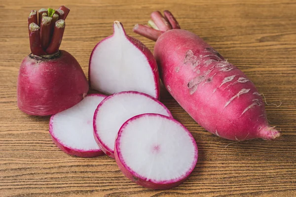 Fresh Pink Radishes on wooden table background. — Stock Photo, Image