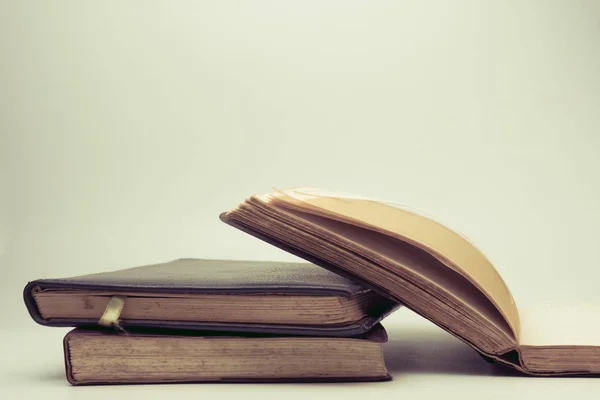 A stack of old books with vintage background. — Stock Photo, Image