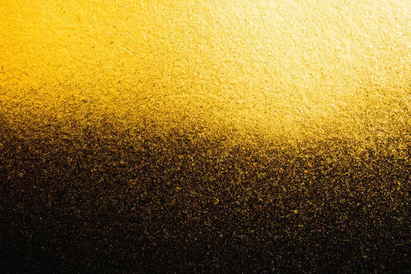 Золотая абстрактная текстура на черном фоне — стоковое фото