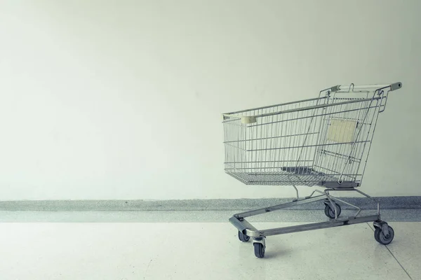 Empty shopping cart on white background. vintage tone. copy space — Stock Photo, Image