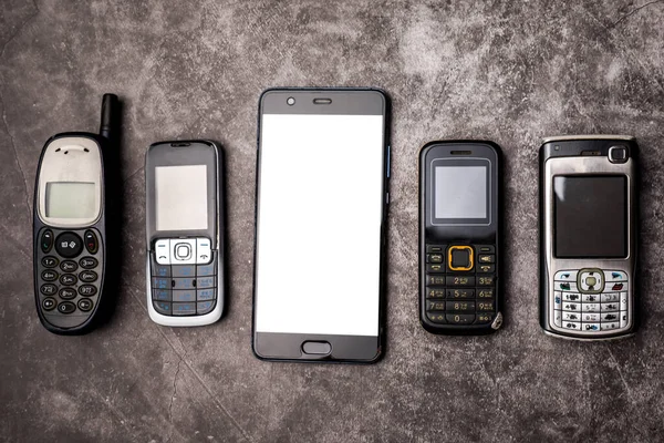 Many Obsoleted Cellphones Smartphone Grunge Background — Stock Photo, Image