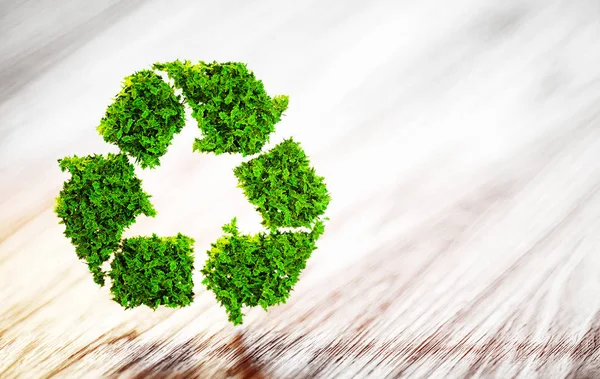 Símbolo de reciclaje de hojas verdes frescas en escritorio de madera con la espalda borrosa — Foto de Stock