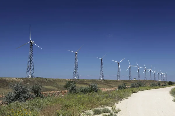 Green energy. Wind farm against a blue sky. — ストック写真