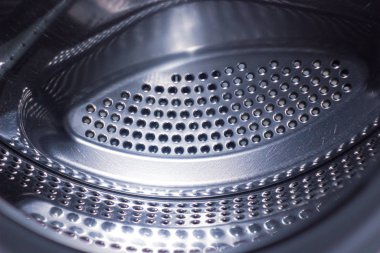 washing machine drum, metal background