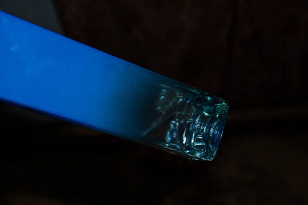 Blue Bottle Black Blurred Background — ストック写真