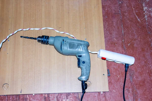 electric drill on wood, electric drill on wood background