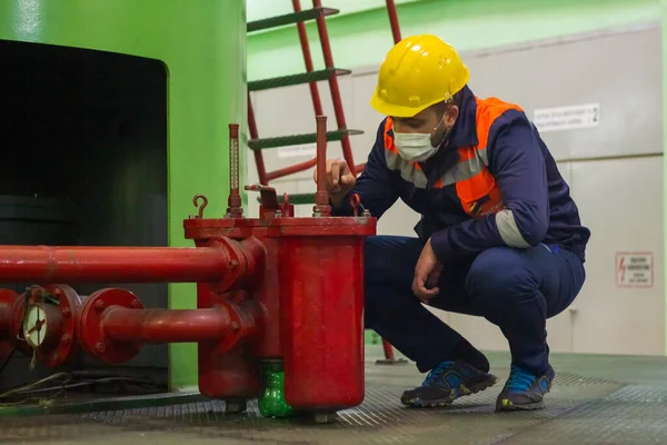 industrial worker with medical mask in factory, worker in factory