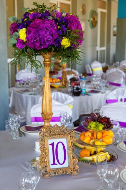 Floral arrangement and gold frame with a number of the decorated clipart