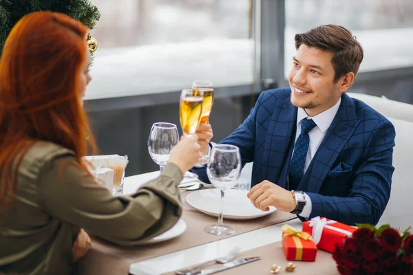 Young caucasian couple celebrating saint valentines day in restaurant — 스톡 사진