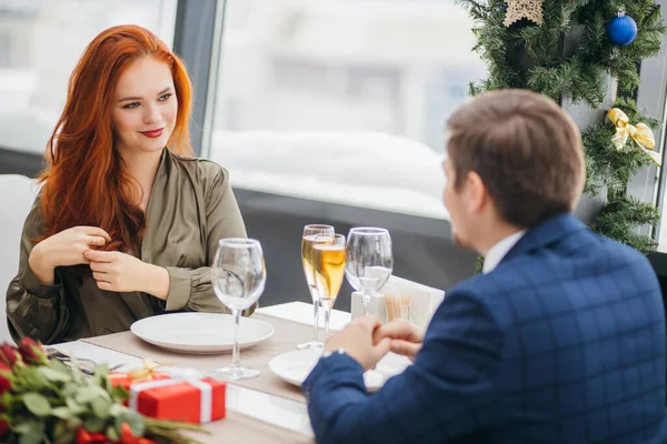 Romantic pastime of young caucasian couple in restaurant — 스톡 사진