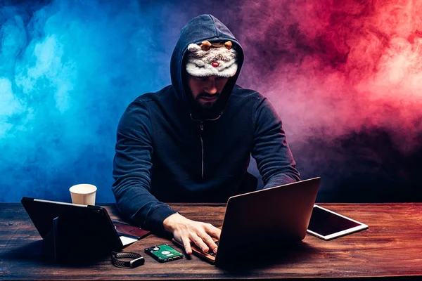 funny hacker man, computer genius engaged in crime