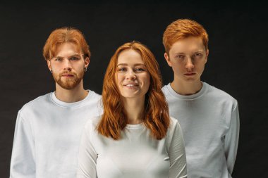 extraordinary redhead people isolated in studio