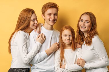 cute red haired brothers and sisters isolated