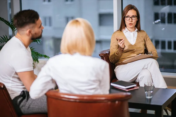 Young professional psychologist sit consulting in her own office — Stock Photo, Image