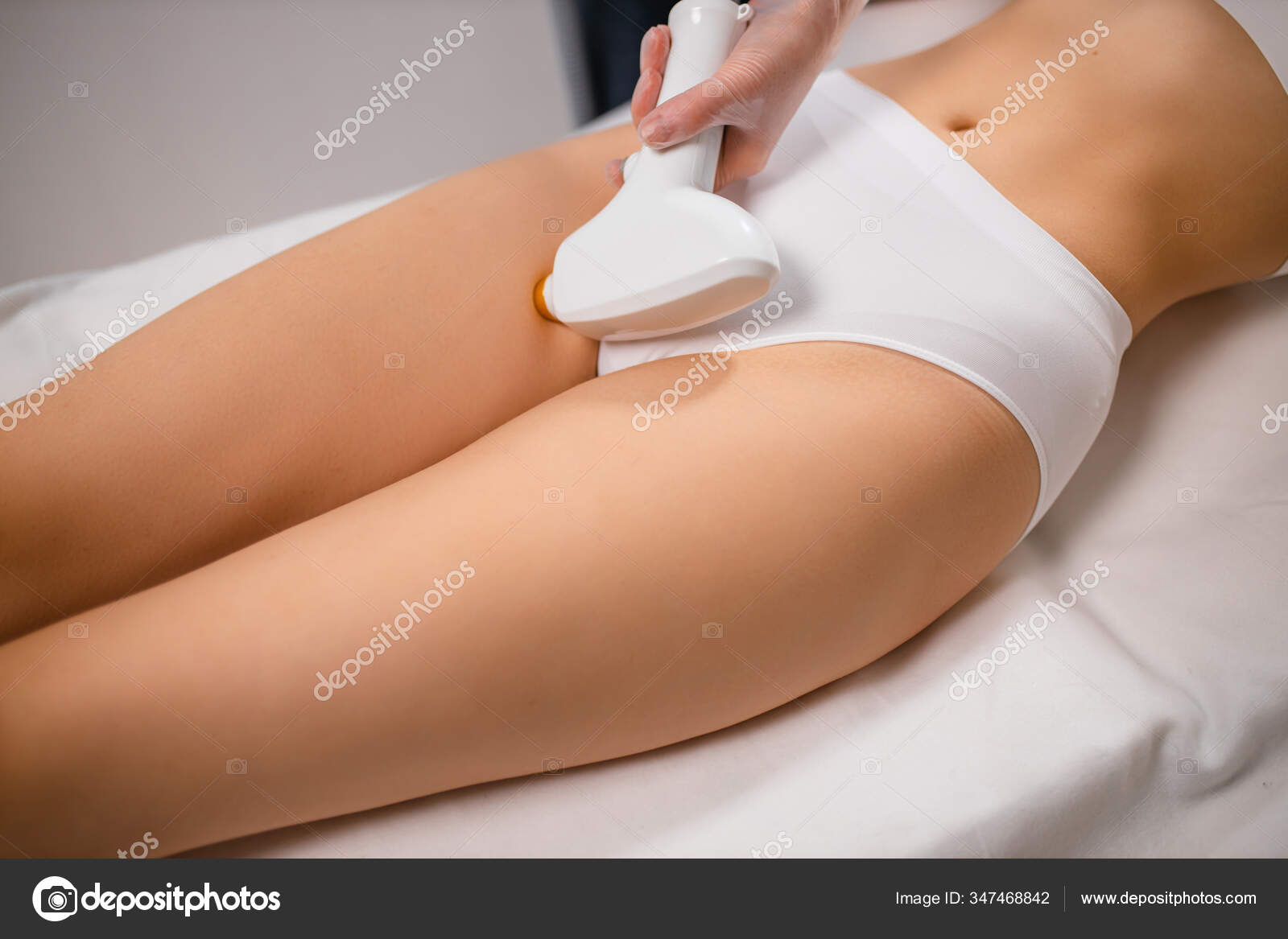 Cropped female lie on bed while getting laser epilation on hips Stock Photo by ©romanchazov27 347468842 Cropped female lie on bed while getting laser epilation on hips Stock Photo by ©romanchazov27 347468842
