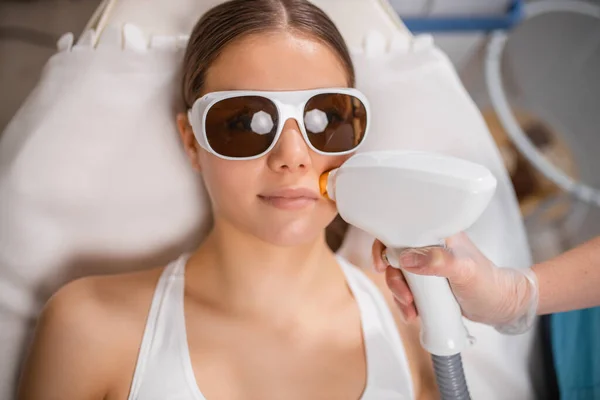 Lady get laser facial hair removal — Stock Photo, Image