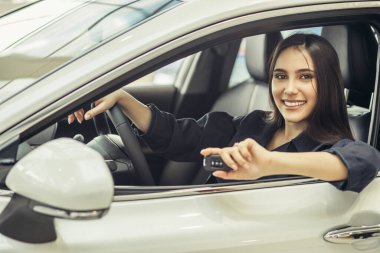 beautiful lady want to buy this new car