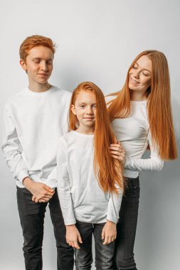cute red haired brothers and sisters isolated