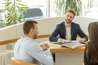 consultant of dealership nice talking with clients