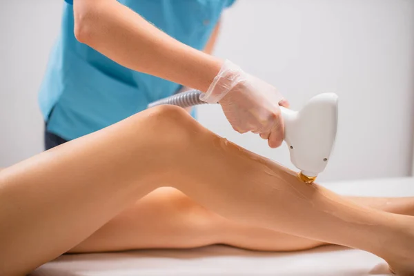 Close-up photo of female getting laser hair removal procedure — Zdjęcie stockowe
