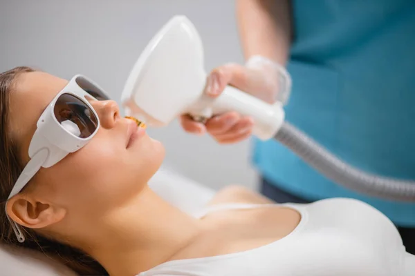 Young woman get laser facial hair removal — Stock Photo, Image