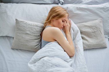 cute, adorable woman is sleeping sweetly