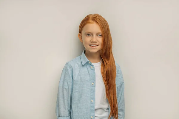Portrait of cheerful positive red haired girl isolated — Stock Photo, Image