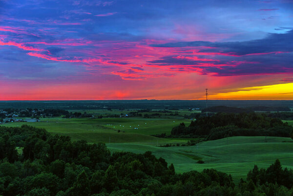 Beautiful summer sunset view from Satrija castle mound in Lithuania