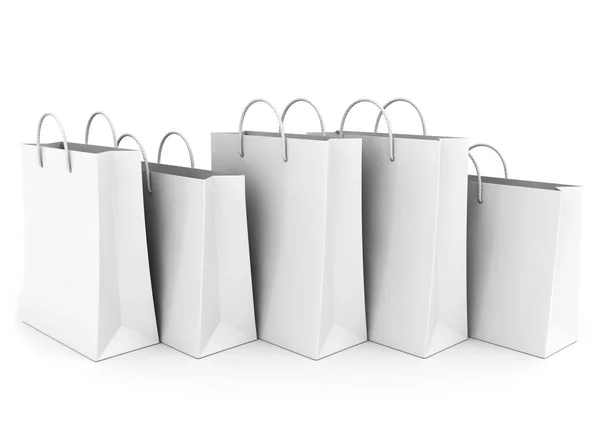 Порожні сумки для покупок на білому. В ряд — стокове фото