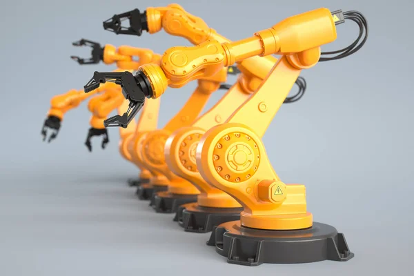 Braços de robô industrial em uma fileira — Fotografia de Stock