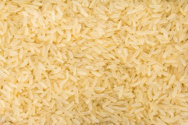 Oryza sativa, Çin pirinci tohumunun bilimsel adıdır. Ayrıca Arroz Agulha parboilizado (Portekizce) olarak da bilinir. Tahılların kapatılması, arkaplan kullanımı.