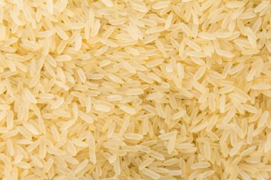 Oryza sativa, Çin pirinci tohumunun bilimsel adıdır. Ayrıca Arroz Agulha parboilizado (Portekizce) olarak da bilinir. Tahılların kapatılması, arkaplan kullanımı.